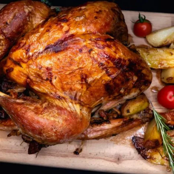 CURCAN INTREG UMPLUT CU LEGUME SI PORTOCALE, COPT INCET aproximativ 4kg
